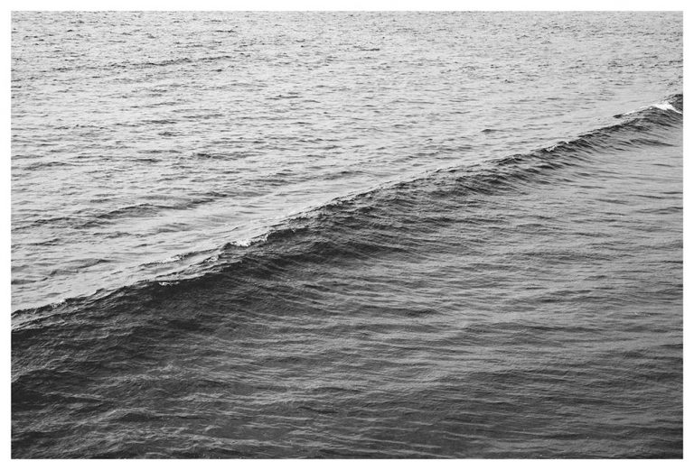 black and white ocean wave photograph