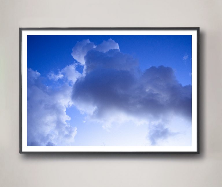 blue clouds photo framed