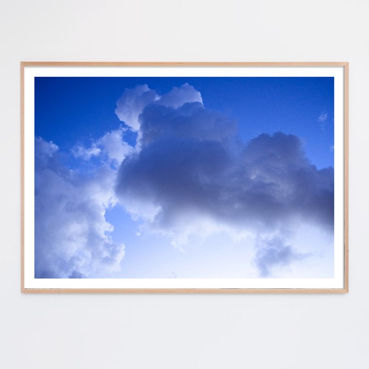 blue clouds photo framed