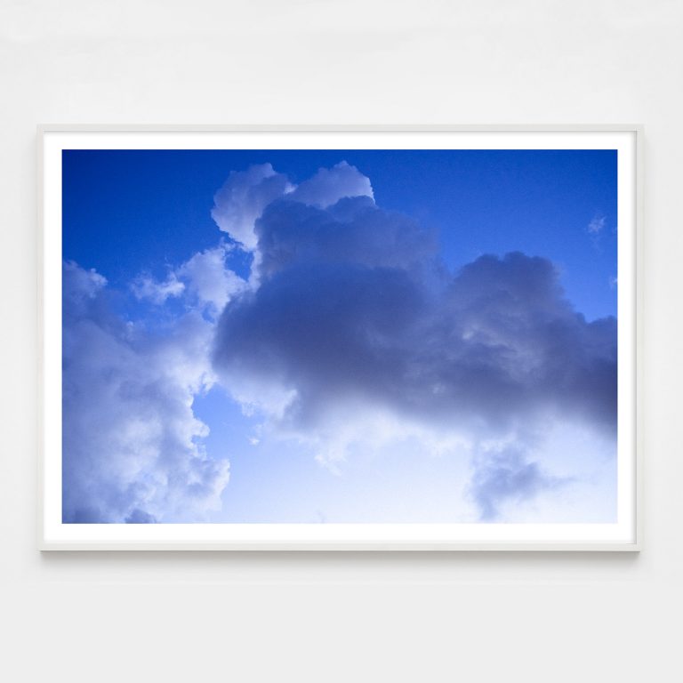blue clouds photo framed
