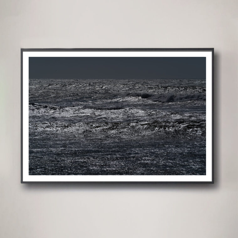 dark black and white moody ocean photograph