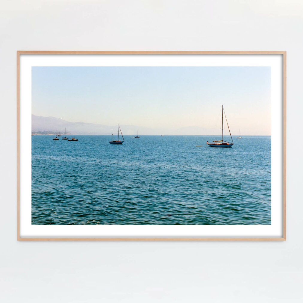 sailboats on ocean photograph