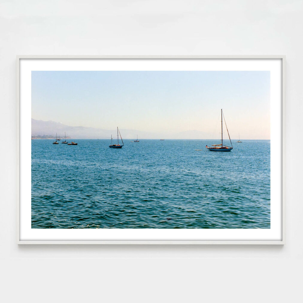 sailboats on ocean photograph