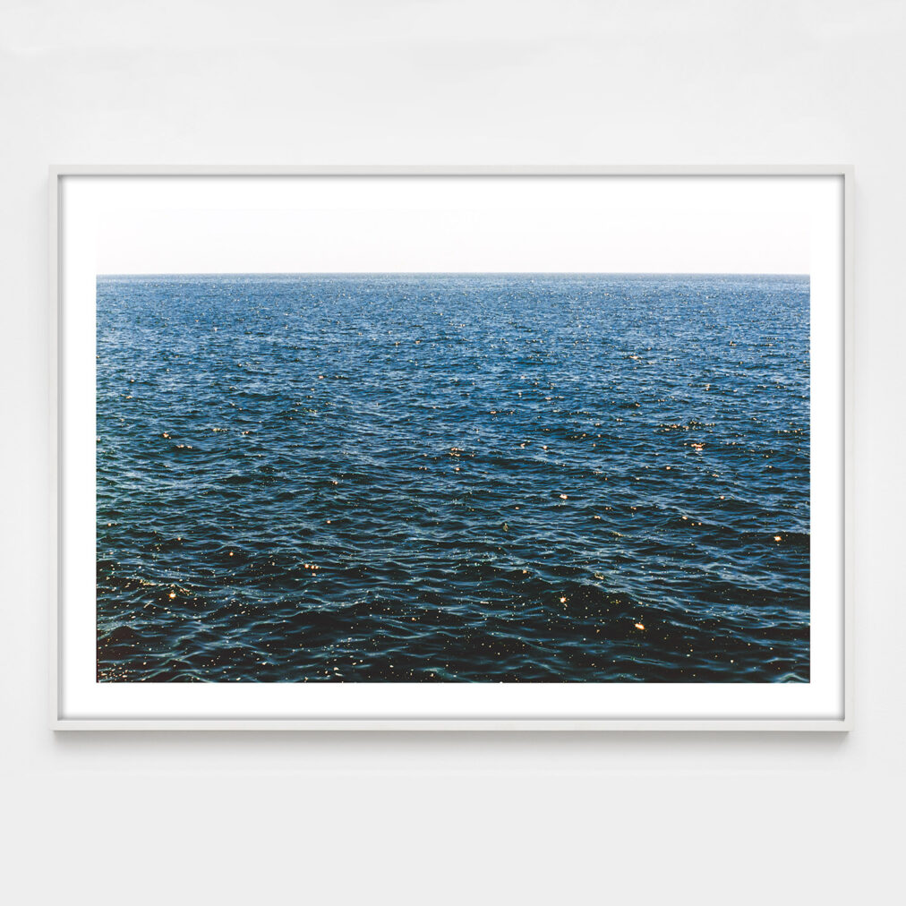 sparkling blue ocean photograph on film