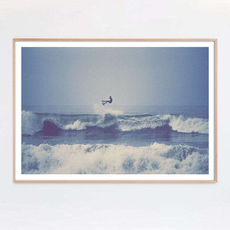 surfer above the waves action photograph