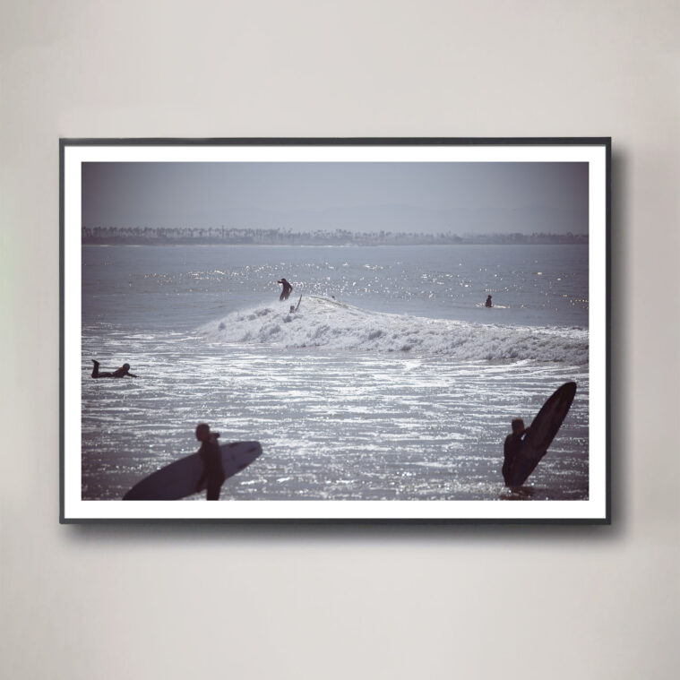 surfer scene at ocean photograph