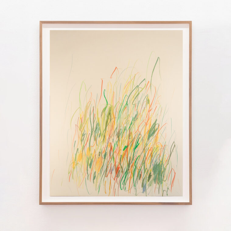 colorful abstract work on paper in yellow, green, and orange